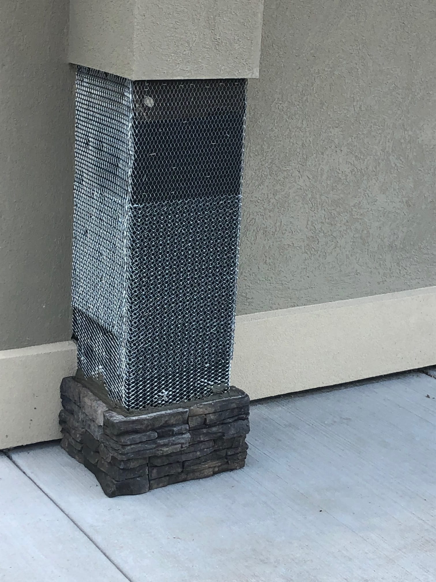 Porch column wrapped in metal lath before stone veneer