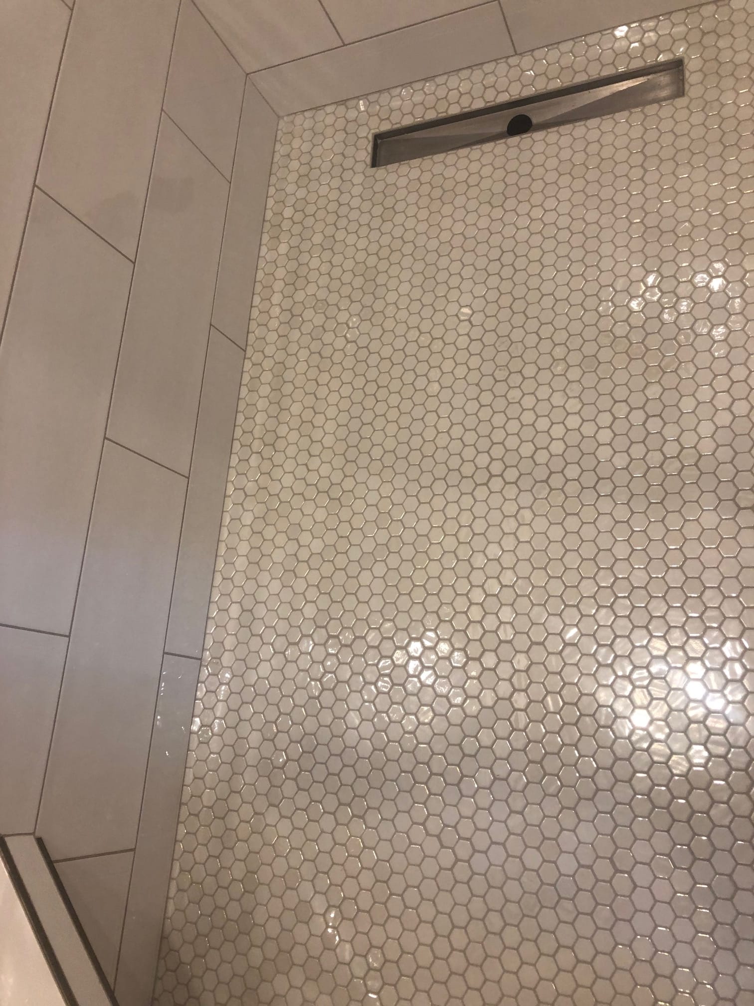 Hexagon mosaic shower floor with linear drain