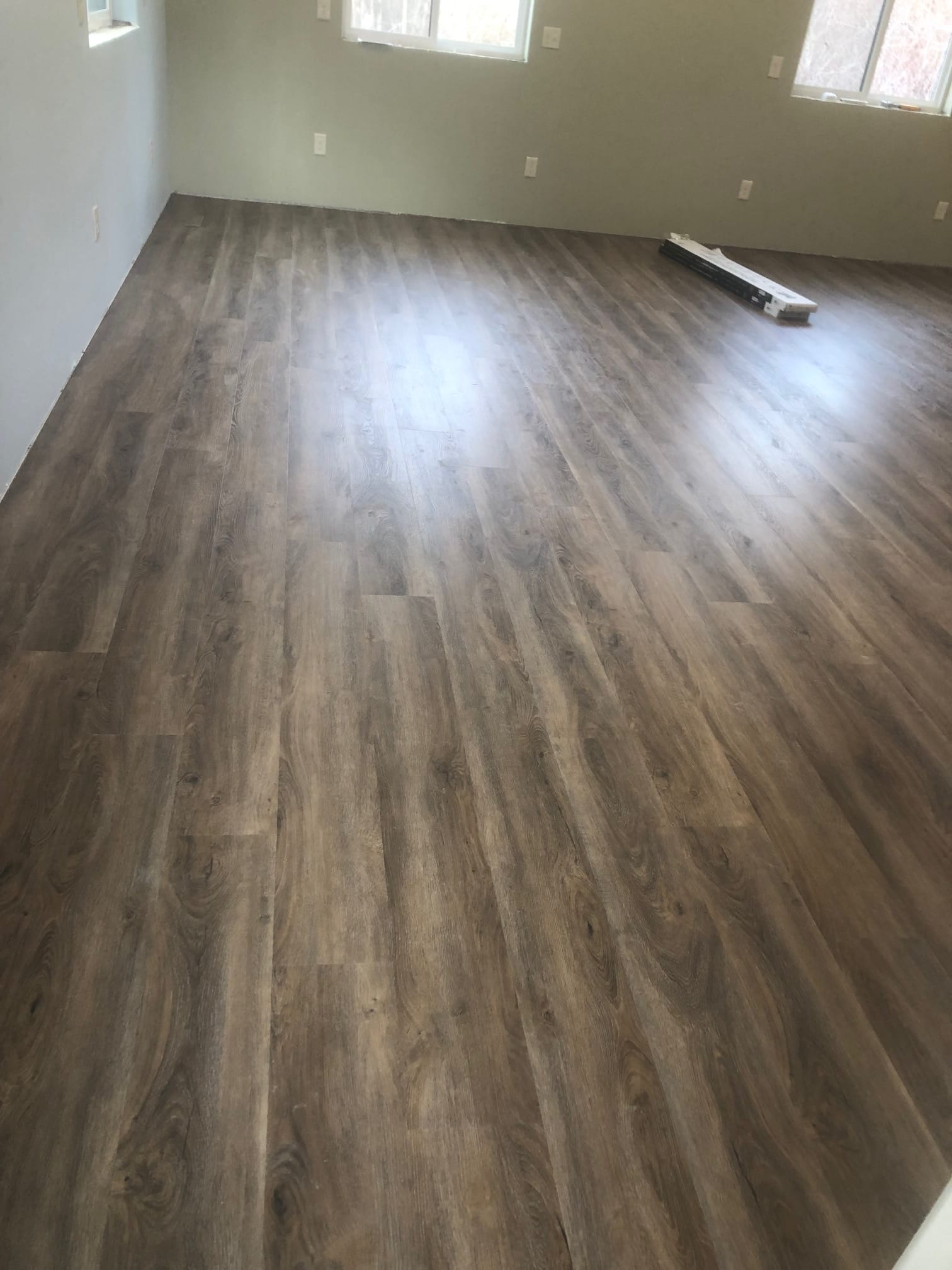 New wood-look plank flooring in a remodeled room